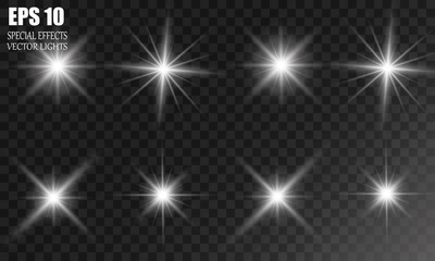 Set of Vector glowing light effect stars bursts with sparkles on transparent background.