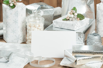 Group Of Wrapped Christmas Gifts, Silver Wrapping Paper, Decorations.