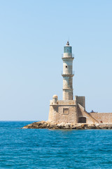 Fototapeta na wymiar Lighthouse in the Venetian port of Chania