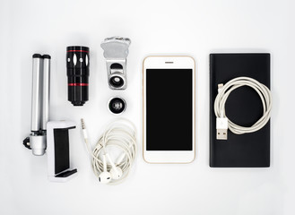 Flat lay (Top view) image of accessories (Tripod Phone Holder, Universal Clamp Camera Lens,...