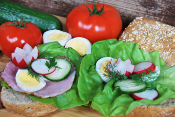 sandwich with radish ham and egg salad on a dietetic breakfast