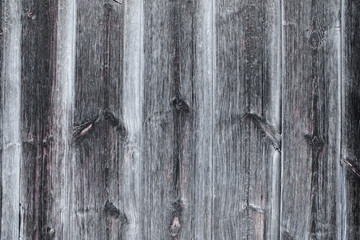 Wooden background. Old and faded strips of gray and brown color with wood grain