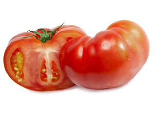 tomato red ripe, whole and in a section on a white background..