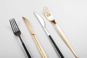 Forks and knives design on white background.