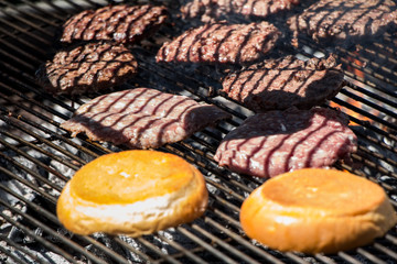 Grilled beef and bun for burgers on summer festival