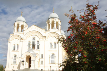 White high church with golden domes in the ancient Russian town of Verkhoturye