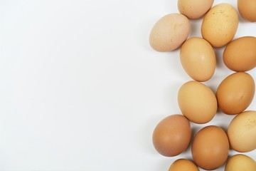 Fresh eggs on white background with copy space. Easter photo concept