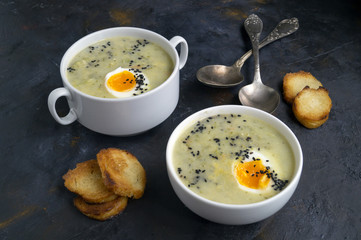 Cream soup with egg and croutons.