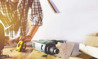 Architect engineer working concept with blueprint and tools on table.