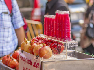 pomegranate juice  on street food of Yaowarat, Bangkok, Thailand