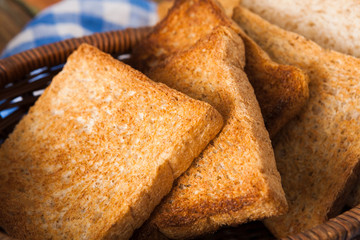 Breakfast background, toasts on checkered napkin closeup