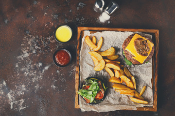 Take away burger menu on wooden tray top view
