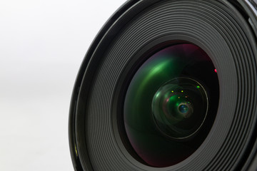 Black camera lens front isolated on white background