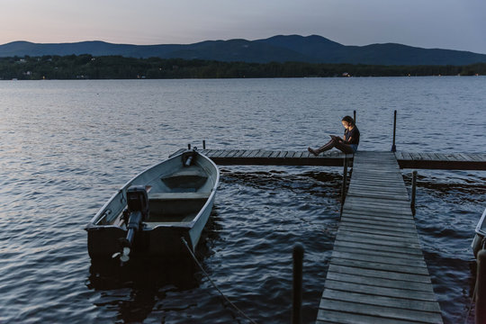 Teen Girl Using Tablet Lakeside