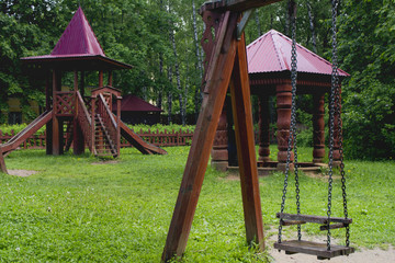 Fototapeta na wymiar Children's playground swing