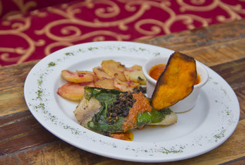 Poached fish fillet and pomodoro sauce