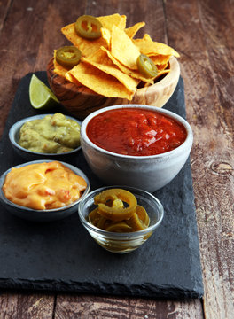 Nachos Tortilla Chips and jalapeños Chili Peppers or Mexican ch