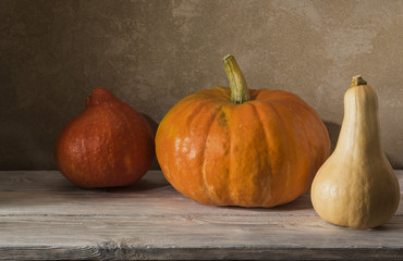 Harvest pumpkin on the table.