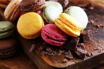 Close up colorful macarons dessert with vintage pastel tones