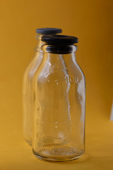 Medical bottle on yellow