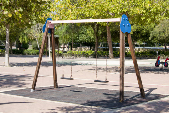 A swing in youthful pack, painted in colors
