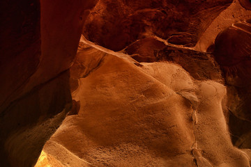 image of beautiful golden light through the cave entrance