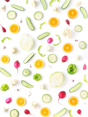 Vegetables and fruits on a white background. Top view, flat lay. Pattern of vegetables and fruits.Collage of food. Top view.Composition from cabbage, green pepper, oranges, green radish, cauliflower.	
