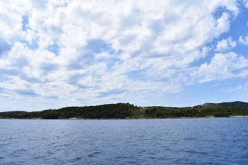 view on adriatic sea from boat islands on background 