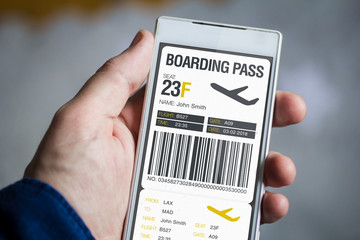 holding boarding pass smartphone