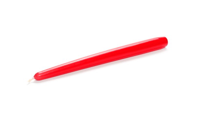Extinguished red candle isolated on white background