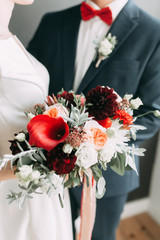 the bride's bouquet of peonies and roses, asymmetrical and modern