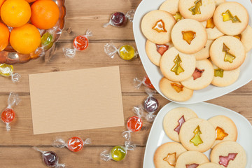 Home Baked Crystal Cookies On White Plates. Oranges, Clementines.