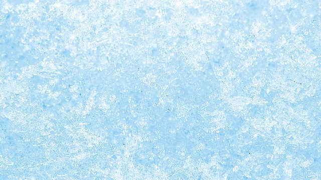 blue frozen christmas particles seamless loop background with snowflakes