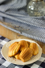 Madeleine, French cookies. Rustic style, selective focus.