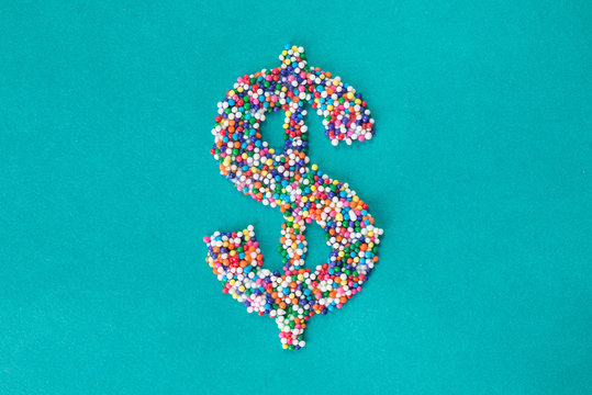 The dollar symbol built from nonpareils