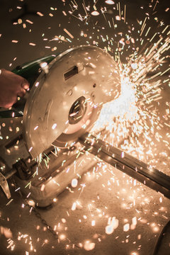 Metalworking /close up of cutting metal with sparks