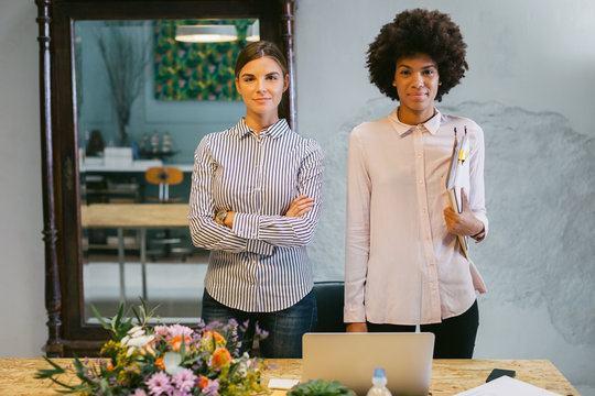 Portrait of a businesswomen standing in a modern office.
