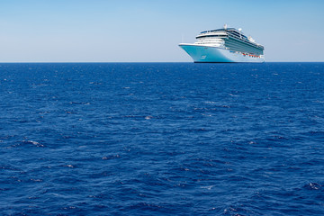 Cruise transportation background. Luxury passenger cruise ship on the Mediterranean Sea.
