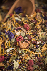 Wooden spoon with tea