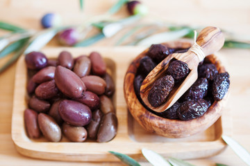 olives on wooden background, kalamata, kalamon, green olives
