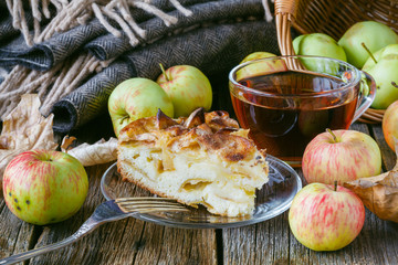 Pie with organic apples and hot brewed tea