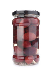 Glass jar with delicious olives on white background