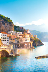 Morning view of Amalfi cityscape on coast line of mediterranean sea, Italy © proslgn