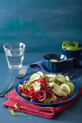 spiralized beet and cucumber salad with avocado dressing, healthy vegan meal