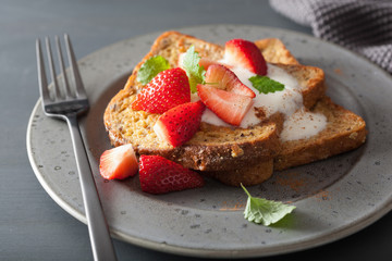 french toasts with yogurt and strawberries for breakfast
