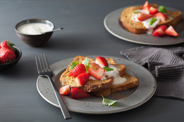 french toasts with yogurt and strawberries for breakfast