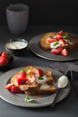 french toasts with yogurt and strawberries for breakfast