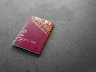 Swedish passport on dark background.