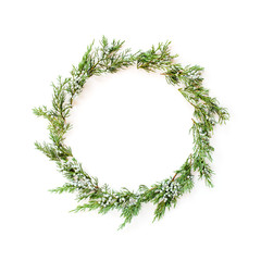 Christmas round frame made of winter evergreens