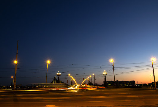 Stone Bridge through Daugava Riga at night by  light of lamps
